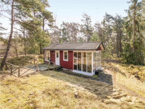 Holiday home Hakkebakkeskogen Nexø IV